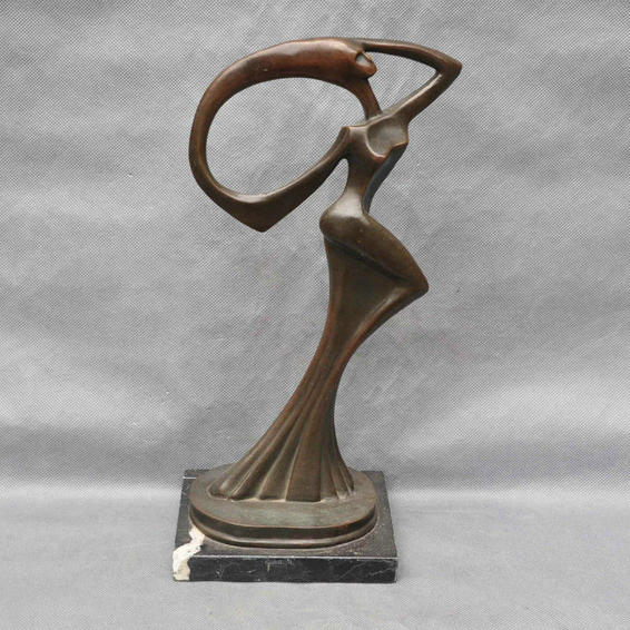Abstract bronze statue of dancing woman