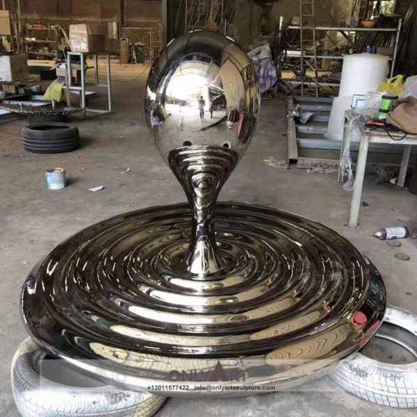 Large stainless steel mirror water drop sculpture in outdoor square